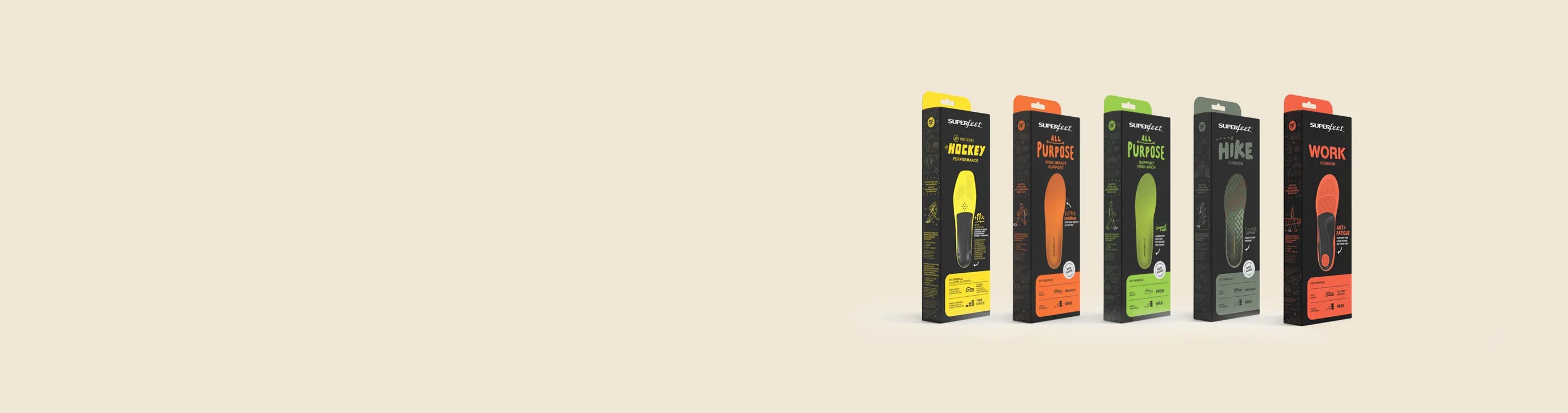 Row of branded product packaging on a beige background