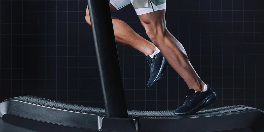 Person using a treadmill with a dark grid background