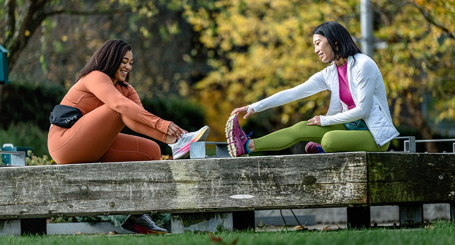 Women stretching as part of a Couch to 5K training plan